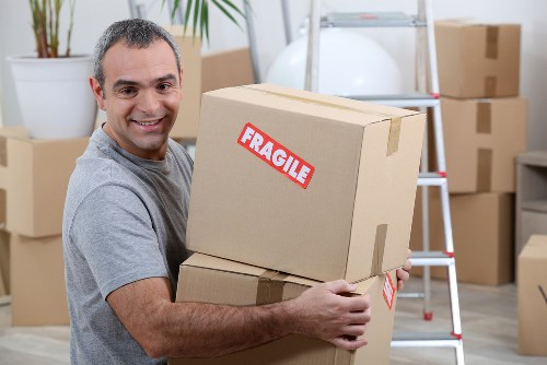 Removal team planning a house move in Marylebone with boxes and furniture