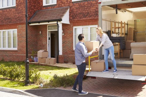 Moving team preparing a home move in Marylebone with boxes and furniture