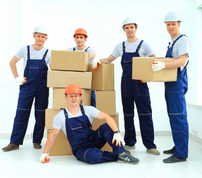 Team member preparing a safe van move with equipment