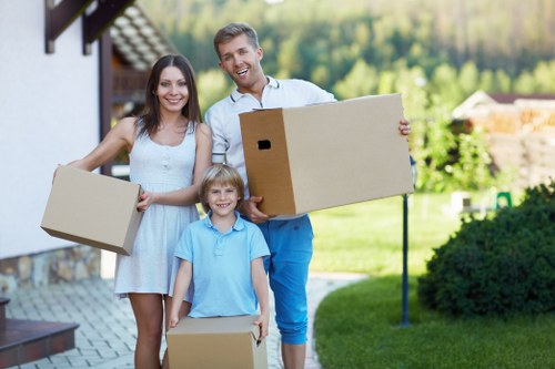 Packed moving boxes and furniture protection materials prepared for a Marylebone home removal