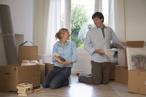 Packed moving boxes and protected furniture ready for removals in Marylebone