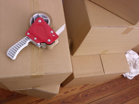 Packing and loading household items into a moving van in Marylebone